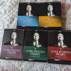 This Was A Set Of Five Sets Of DVDs Of Alfred Hitchcock Movies On DVDs