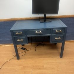 Custom painted desk from Nigel’s Los Angeles navy blue