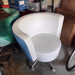 Pair of MCM Peter Maly Swivel Captain’s Chairs