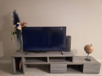 Gray Tv stand , in great condition! Must sell soon
