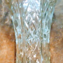 Vintage Anchor Hocking Prescut Clear Star of David pattern clear glass hexagon shaped vase. Pressed Star and fan design. Measures 8 1/4" Tall
