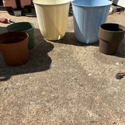 5 flowers pots . All for $20 .