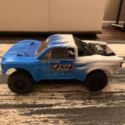 ARRMA Senton 4x4 RC Car With 2 Batteries And Passport P1 Mini Charger