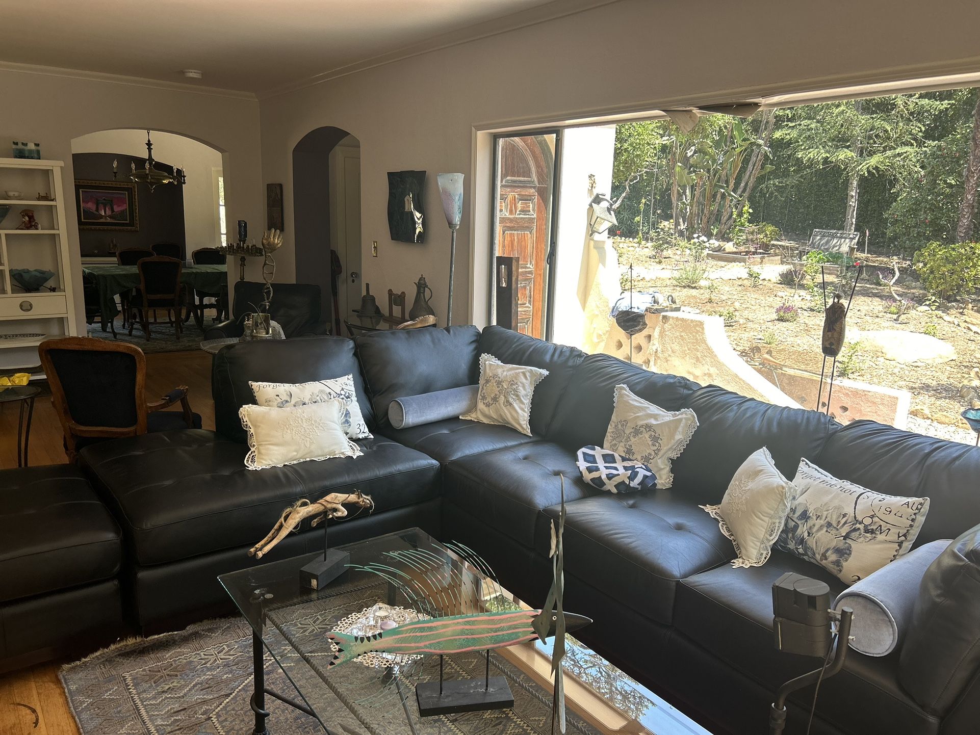 Gently used  Leather Sectional With Leather chair And Ottoman 