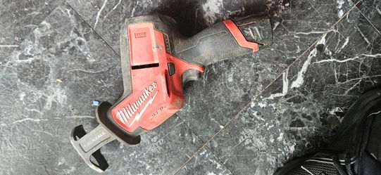 Milwaukee M12 tools. Drill, hacksaw