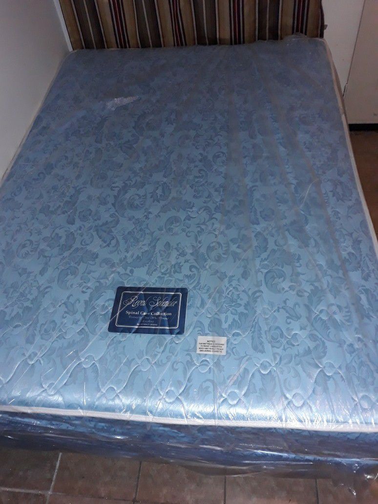 Full size bed with box spring and metal frame