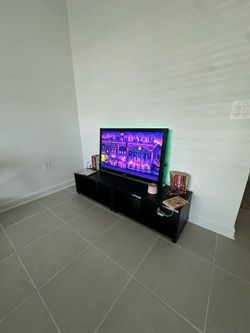 50 inch Tv (with TV stand + Roku)