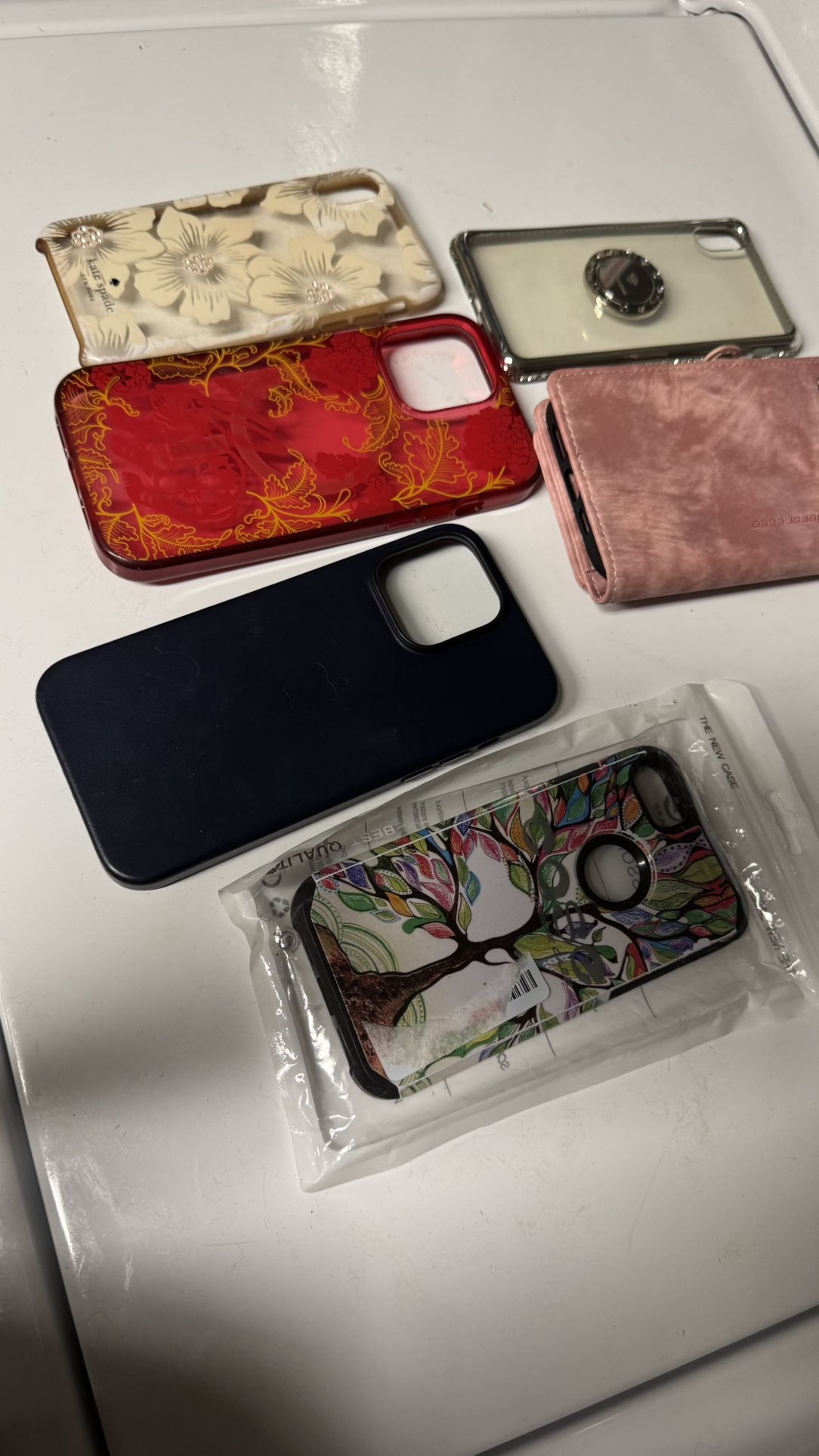 Cell phone case lots variety of sizes includes Kate Spade , Apple and Cyclone, etc.