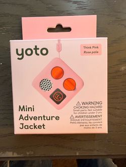 Yoto mini  music box. Pink sleeve and 23  satiety of Yoto cards