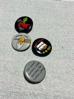 4 small badges