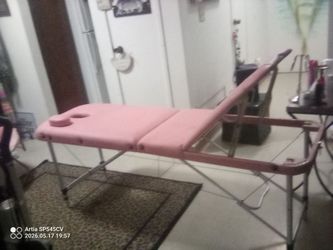 Pink massage table