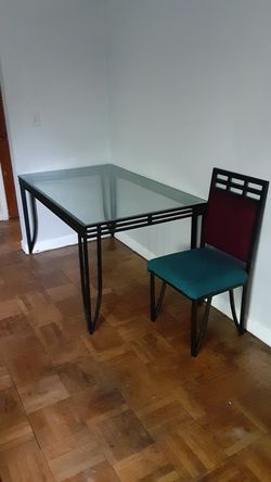 Glass table set with 5 chairs