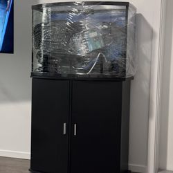 38 Gallon Bow Front Fish Tank, Cabinet  And Accessories Like New