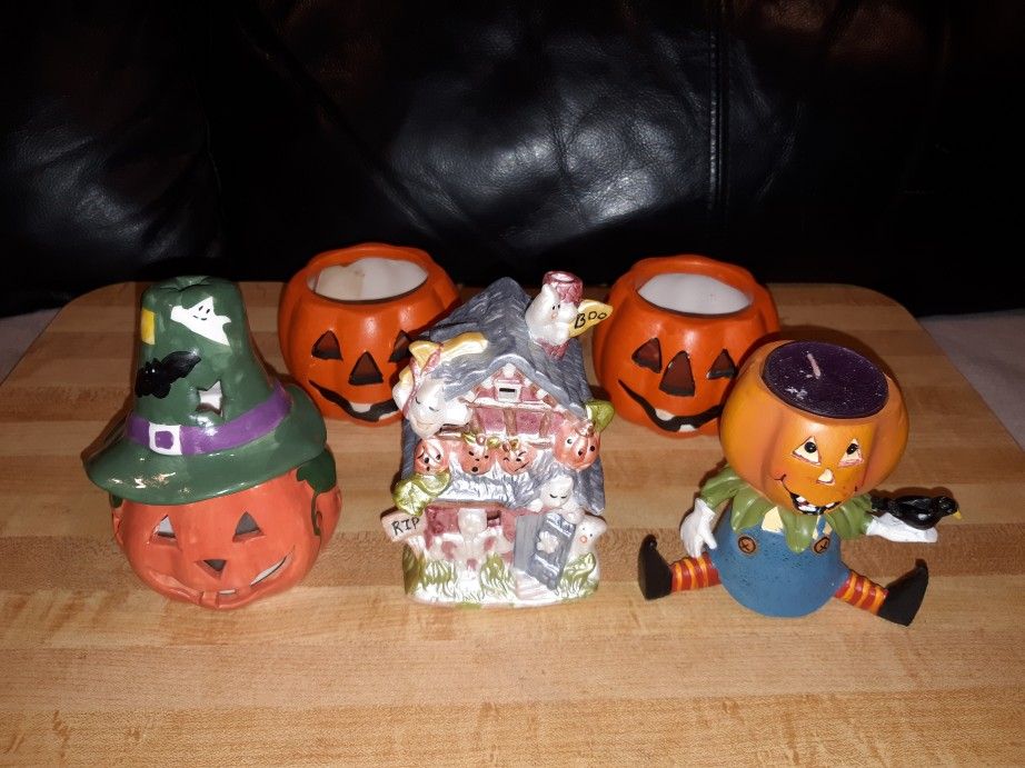 COLLECTION OF 5 NEW HALLOWEEN THEMED CANDLE HOLDERS, CANDLES.. 3 HALLOWEEN HAND PAINTED CERAMIC TEA LIGHT CANDLE HOLDERS & 2 PUMPKIN CANLDES
