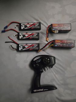 RC CARS BATTERIES  AND REMOTE