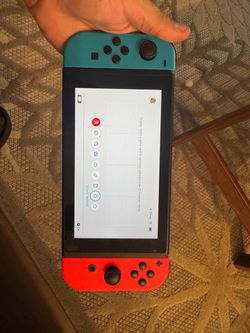 Nintendo Switch with Teal and Red Joy-Cons