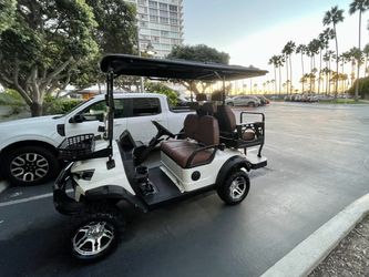 White 4-Passenger Golf Cart