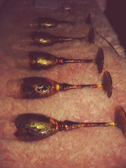 6 ONE OF A KIND hand blown and designed champagne glasses...unused