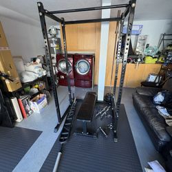 Olympic weight set with bench, squat rack, multiple bars and plates - Home Gym 