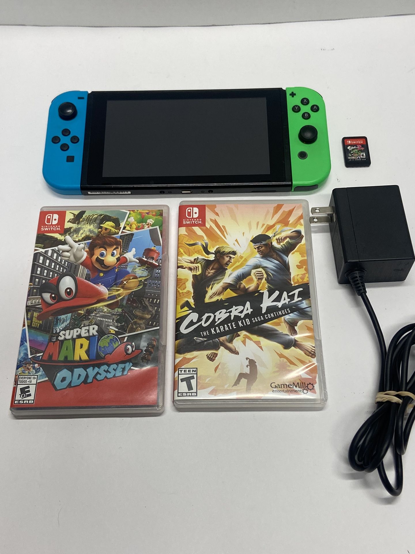 Nintendo Switch For Sale $190 OBO. Or Trade For Old Video Games. Tested. Works. ***NO DOCK*** Comes with 3 games and charger.