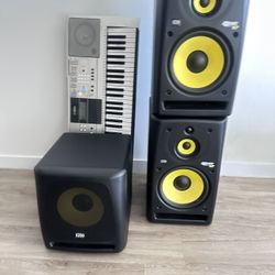 KRK 10 3  Speaker With Sub Woofer  And A Keyboard 