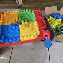 mega block table with box of blocks