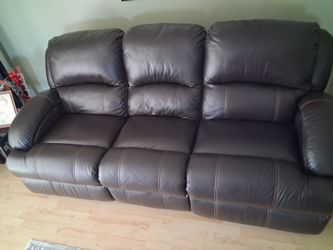 Brown leather sofa new want to sale moving