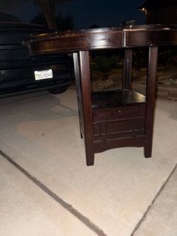 Table with storage compartment