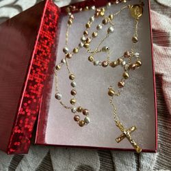 Rosary  Gold Plated.    $30 Firm.    91 Ave Thomas 