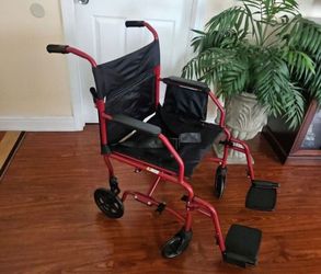 Like New Transporter Wheelchair from Walgreens Holds Up To 300Lb