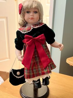 2 Porcelain Christmas Dolls