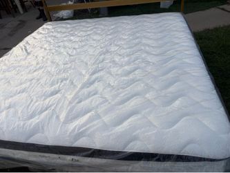 Brand new king size bed with mattress