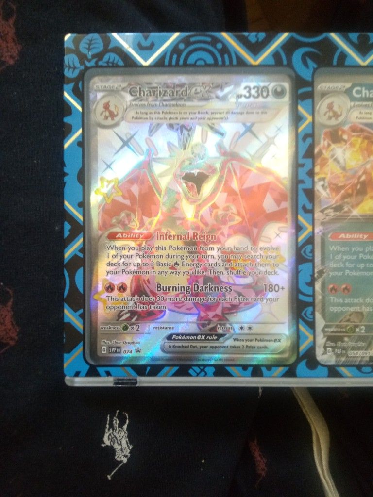 5 Different Pokemon Charizard Cards Plus Other Random Cards