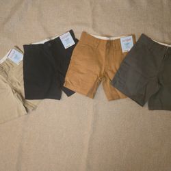 4 piecesFlat-front shortsAdjustable waist At kneeBrand new4 different color