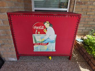Red Coca-Cola folding portable bar with pin up graphic