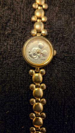Gold tone Mickey Mouse wrist watch