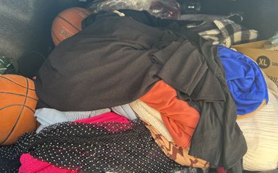 Bag Full Of New Clothes And Prom Dresses 