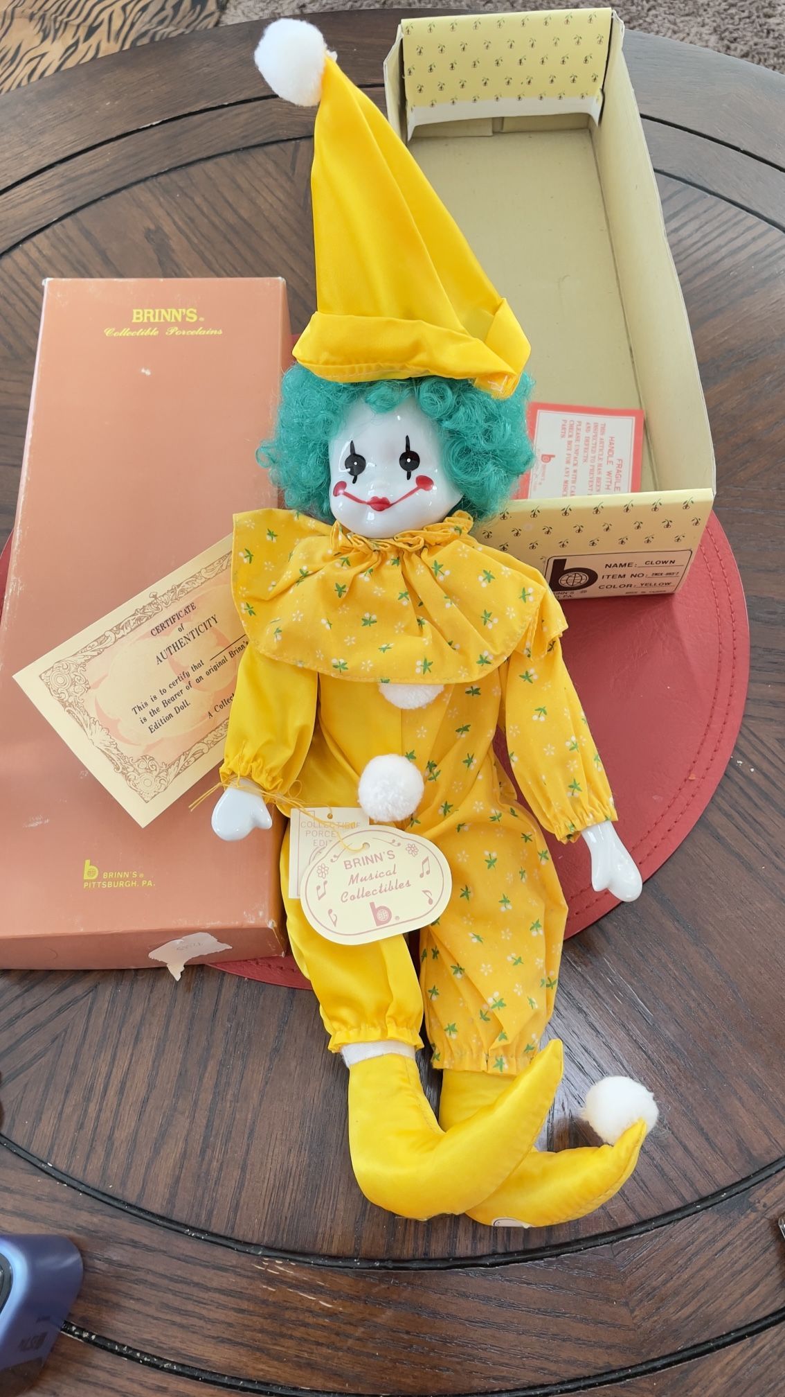 RARE Brinn's Collectible Porcelain musical Clown Doll.Comes with original box and COA