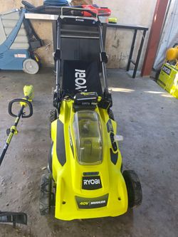 Ryobi 40-Volt 20-Inch Cordless Lawn Mower with Quiet Design and String Trimmer, Including One 4Ah Battery and Charger