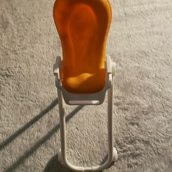 Vintage 2017 Barbie Highchair.  Folds flat for easy storage.  Orange & White.  I bundle so please check out my other Barbie and numerous items listed.