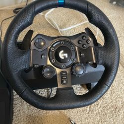 Logitech G923 Racing Wheel And pedals $175