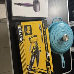 Le Creuset Pot, Electric Chainsaw And Slope hill Hair Dryer