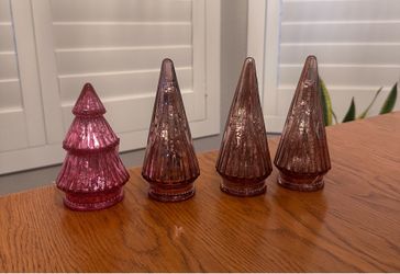 $15 - Add a soft, vintage glow to your holiday decor with this beautiful set of 4 glass tabletop Christmas trees! 1 pink 5.5” & 3 gold 6”. Perfect f