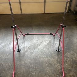 Adjustable gymnastics bar