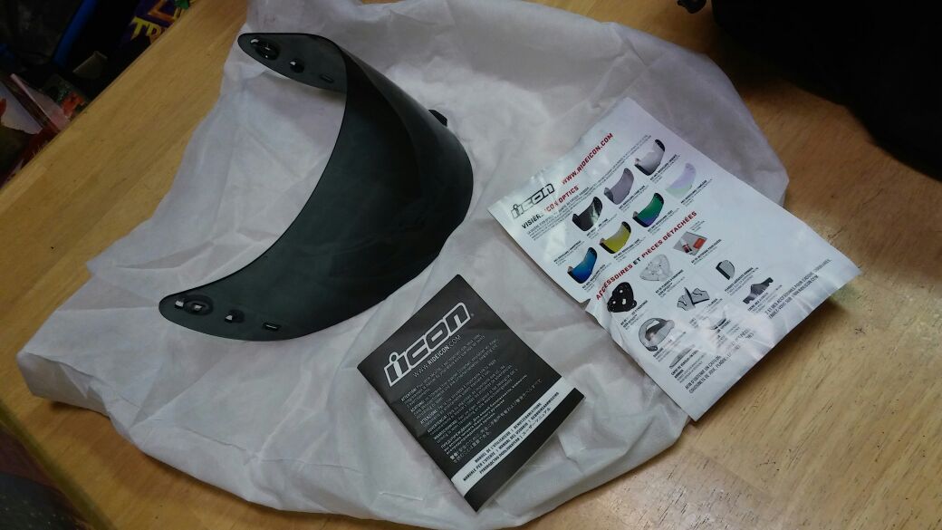 Helmet tinted sheild