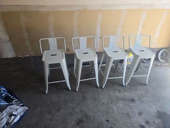 Set of 4 white industrial metal bar stools with backs