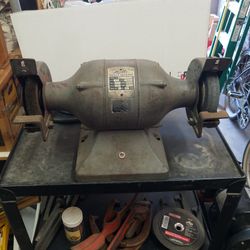 Mall Heavy Duty 6 In Bench Grinder.  1/3 Horsepower 3450 RPMs Wheel Size Is 6-in X 3/4 In. Made In The USA.