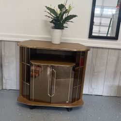 TV stand or bookcases with darkened glass. Looks Like New. 