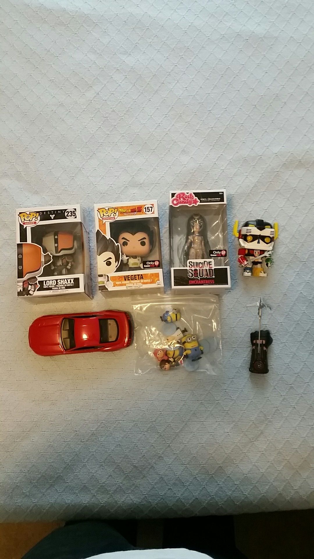 Shelf collectables. Video games cars and toys