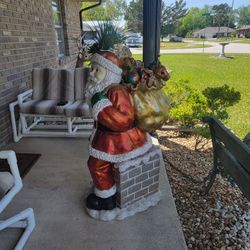 Large Santa Claus Coming Out Of Chimney